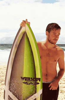 liam payne surfing at the beach