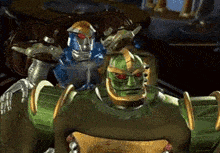 a couple of robots are standing next to each other in a dark room .