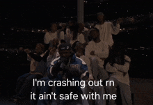 a group of people are posing for a picture with the caption i 'm crashing out