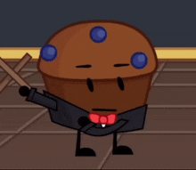 a cartoon cupcake with blueberries on it 's head