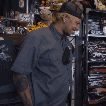 a man wearing a shirt that says designers on the front