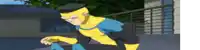 a man in a yellow and blue superhero costume is kneeling down on the ground .