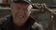 a man with his mouth open and the words kiss my yankee ass