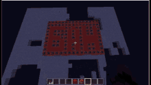 a screenshot of a minecraft game with a red item on the bottom right
