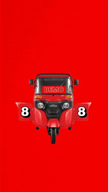 a red bemo scooter with the number 8 on the side
