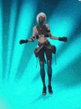 a woman with a mask on her face is dancing with her arms outstretched