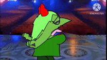 a green cartoon character with red horns is dancing on a stage with the words kinemaster at the bottom