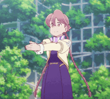 a girl in a purple dress is standing in front of trees