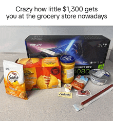 a box of pny geforce rtx 2080 sits on a counter next to a bag of goldfish crackers