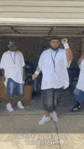 a group of men are dancing in a garage with the caption about to get out this bitch !!!