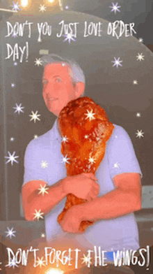 a man holding a large chicken leg with the words " don t you just love order day "