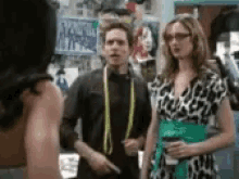 a man and a woman standing next to each other