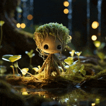 a small figurine of a tree with roots and leaves on it