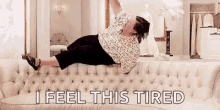 I Feel This Tired Jump In The Couch GIF - I Feel This Tired Jump In The Couch GIFs
