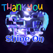 a purple heart with the words thank you shine on on it