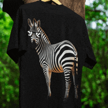 a black shirt with a zebra wearing sunglasses