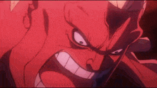 a close up of a person 's face with a big mouth and a red background .