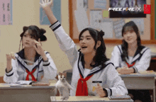 a girl raising her hand in a classroom with a free fire x logo on the wall