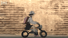 a girl is riding a motorcycle in front of a brick wall with the letters as visible