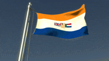 a blue white and orange flag with a british flag and a dutch flag