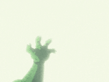 a cartoon drawing of a green monster laying on the ground with a blue background