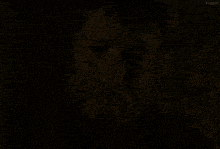 a close up of a man 's face with the words you shit eaters