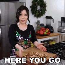 Here You Go Grab Some Please GIF - Here You Go Grab Some Please Emily Kim GIFs