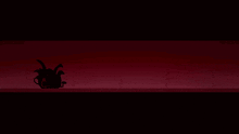 a silhouette of a plant in a dark room against a red wall