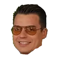 a close up of a man 's face with glasses on