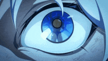 a close up of a person 's eye with a blue glow
