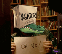 a crocodile holding a sign that says " oh no "