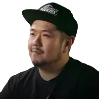 a man wearing a hat that says lakers on it