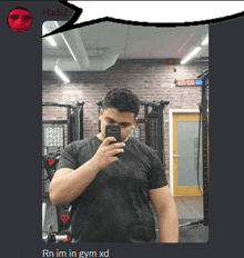 a man taking a picture of himself in a gym with a speech bubble that says hadiz