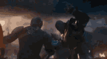 a blurred image of a person holding a skateboard with the words ' epscene ' on the bottom