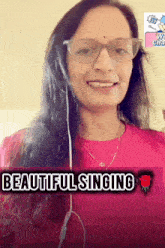 a woman wearing glasses and a pink shirt with the words beautiful singing above her