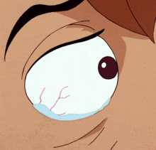 a close up of a cartoon character 's eye with a tear running down it