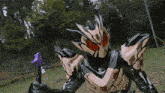 a purple sword is being held by a cartoon character