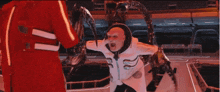 a man in a white suit has the number 31 on his shirt