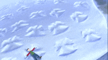 a cartoon character is laying in the snow