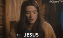 a woman is saying jesus in a video