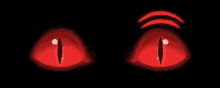 a pair of red eyes with a white pupil on a black background