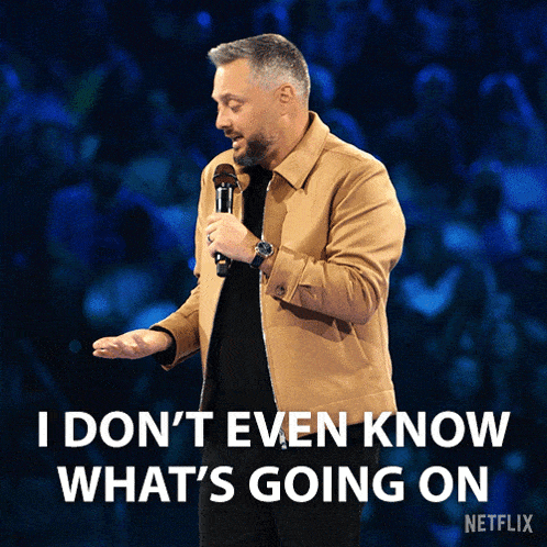 a man holding a microphone with the words 
