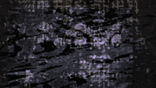 a purple and black background with a few white lines on it