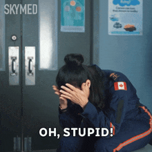 a woman covering her face with her hands and the words oh stupid