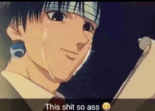 a man with a bandage on his head is crying while holding a piece of paper and says this shit so ass .