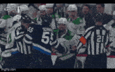 a hockey player with the number 55 on their jersey