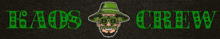 a picture of a man with a beard wearing a green hat and glasses