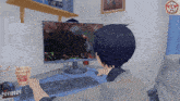 a cup of crunchy noodles sits next to a person playing a video game