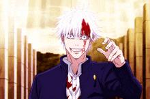 a man with blood on his face is smiling and giving the thumbs up sign