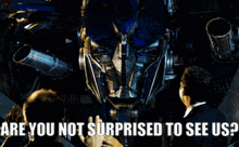 a picture of a robot with the words " are you not surprised to see us " below it